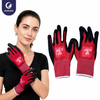 Justcare red black nitrile sandy work gloves, female model wearing safety work gloves, white background
