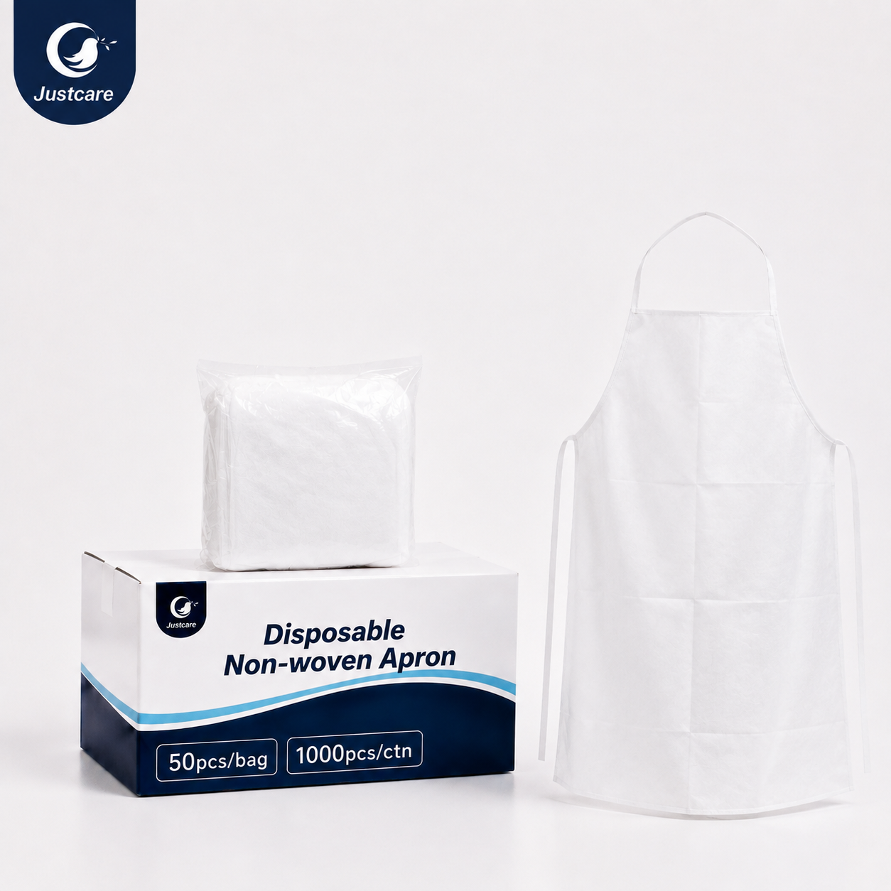 Justcare Disposable Non‑woven Apron, carton package and non‑woven disposable apron product shot on white background