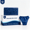 Justcare disposable men's briefs packaging carton, deep blue non-woven briefs in transparent bag on box, studio white background, bulk packing details