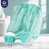 Justcare non-woven disposable bath gown closeup, elastic top, heat-sealed edges, lightweight breathable nonwoven spa skirt